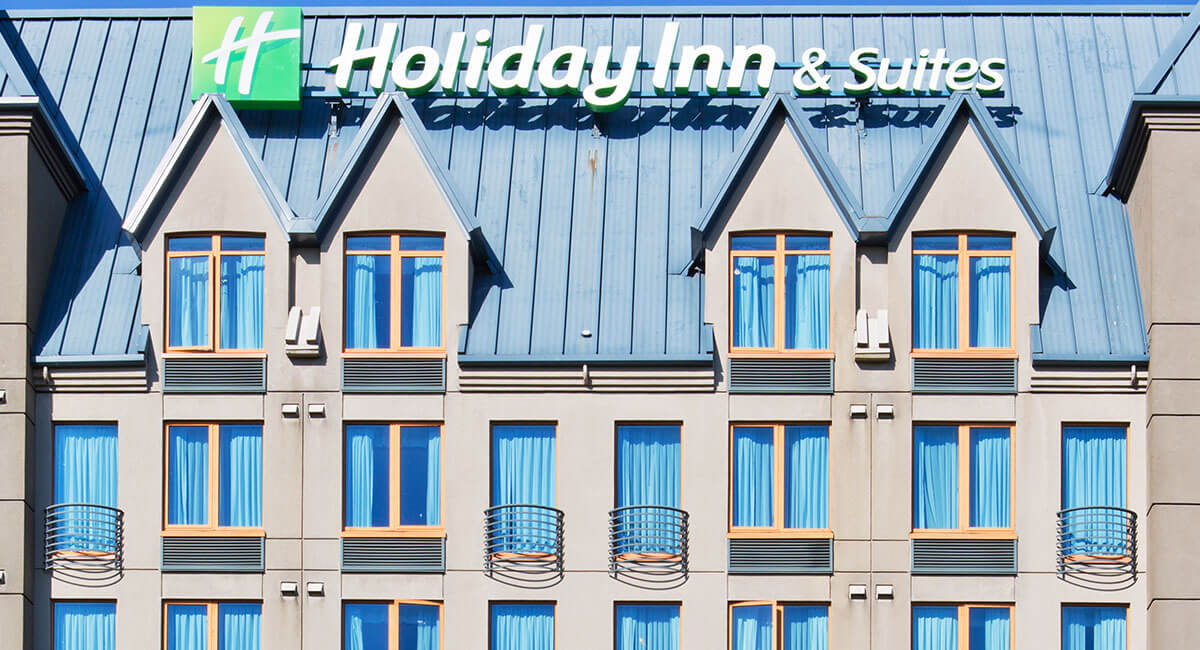 Frontal view of the Holiday Inn North Vancouver and signage