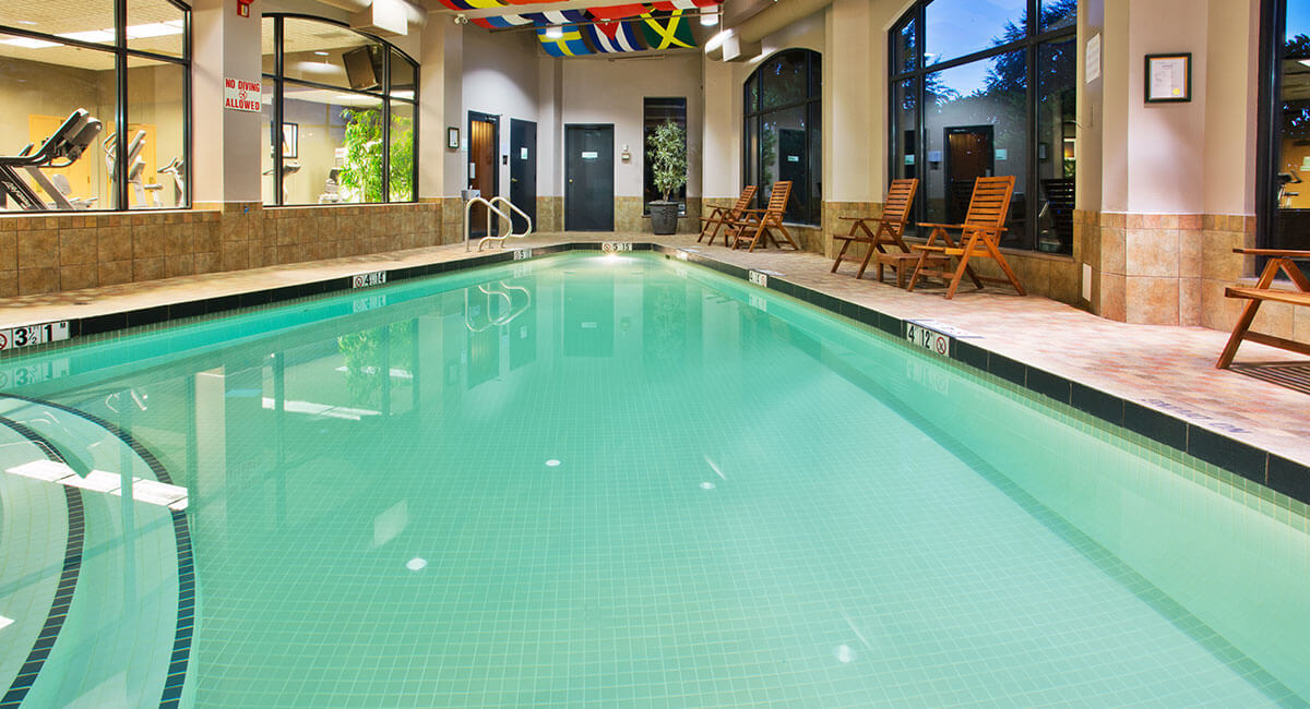 Heated indoor swimming pool with crystal clear waters at the Holiday Inn North Vancouver
