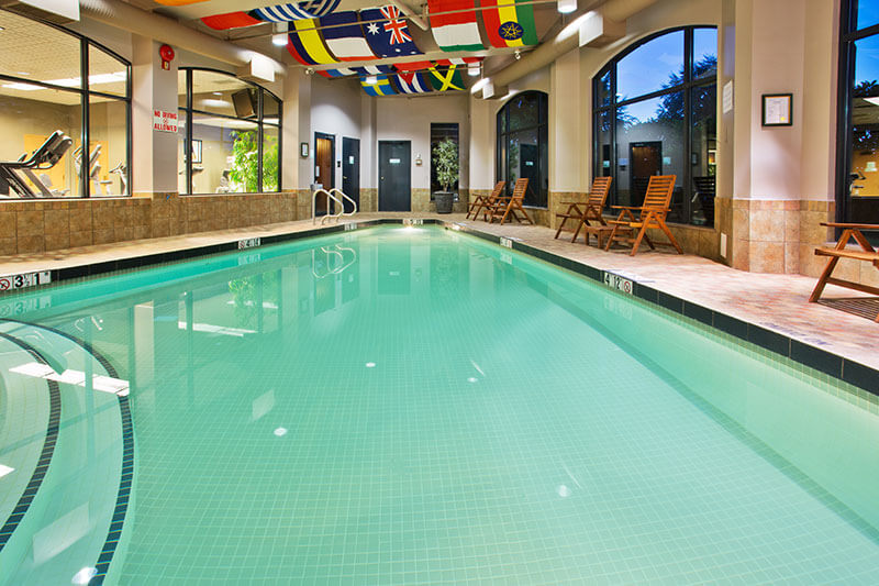 Clear blue indoor swimming pool at Holiday Inn North Vancouver